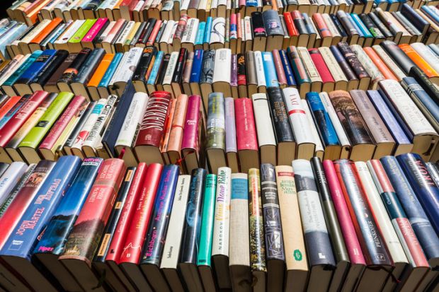 Selling books at a street market in the center of Dusseldorfs, North Rhine-Westphalia, Germany.